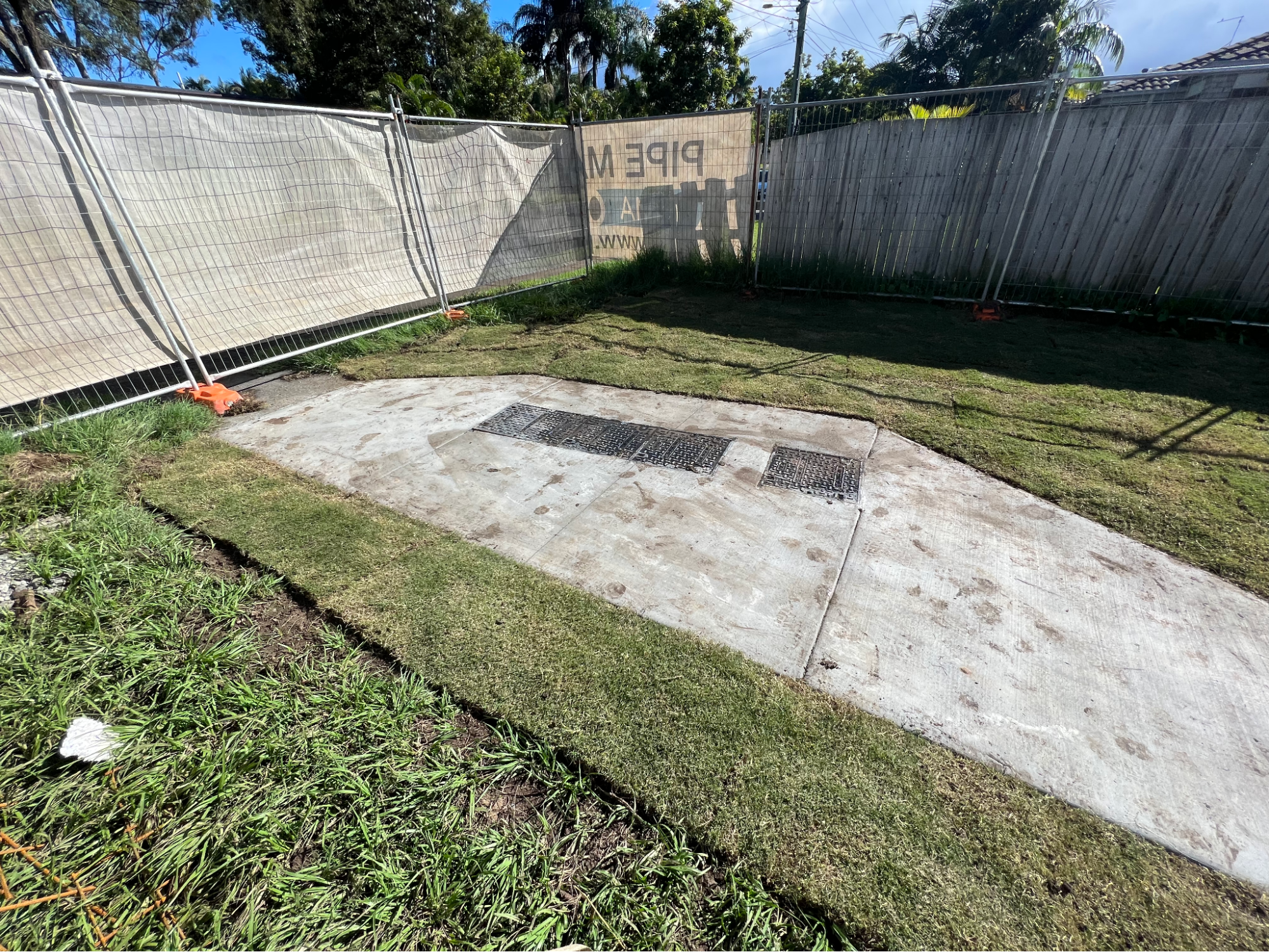 Completed access slab with compliant cast-iron covers