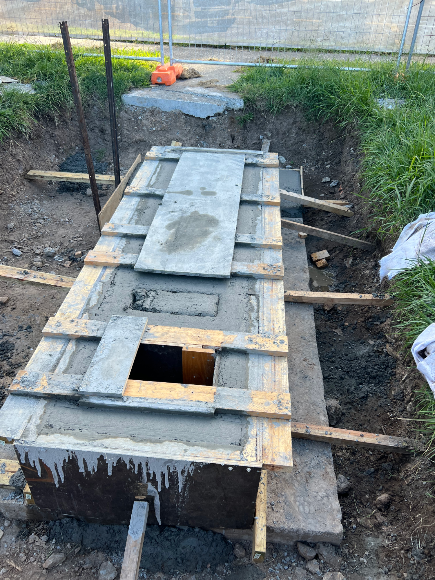 Formwork over the chamber with access opening cast