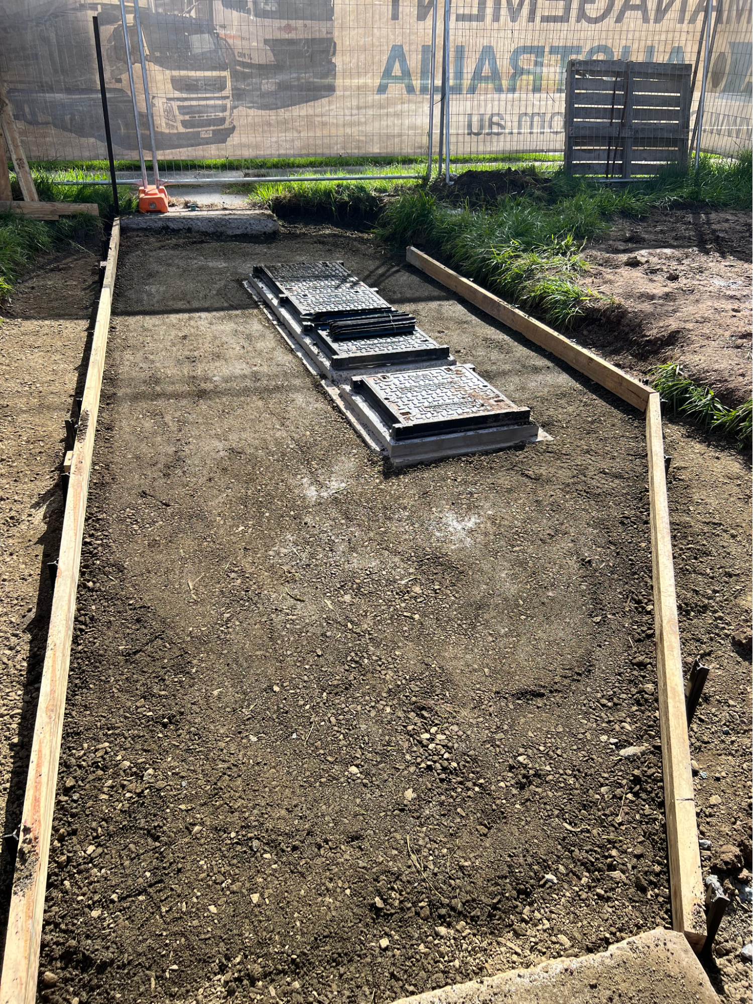 Access covers set on the prepared base